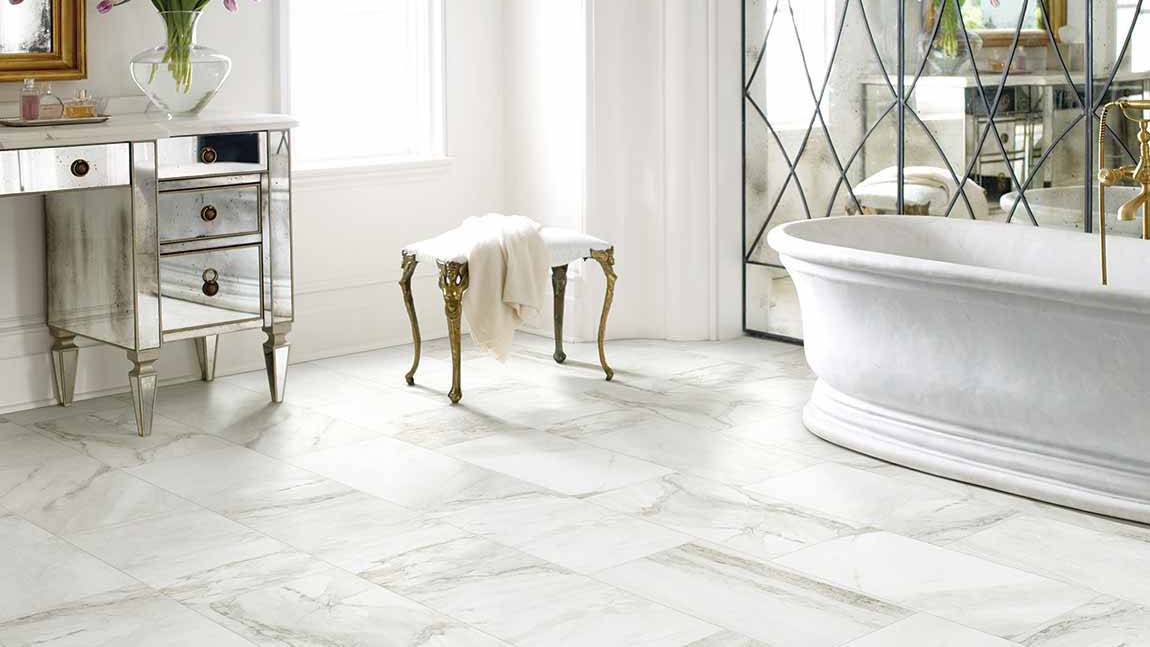 Tile flooring in a bathroom, installation services available.