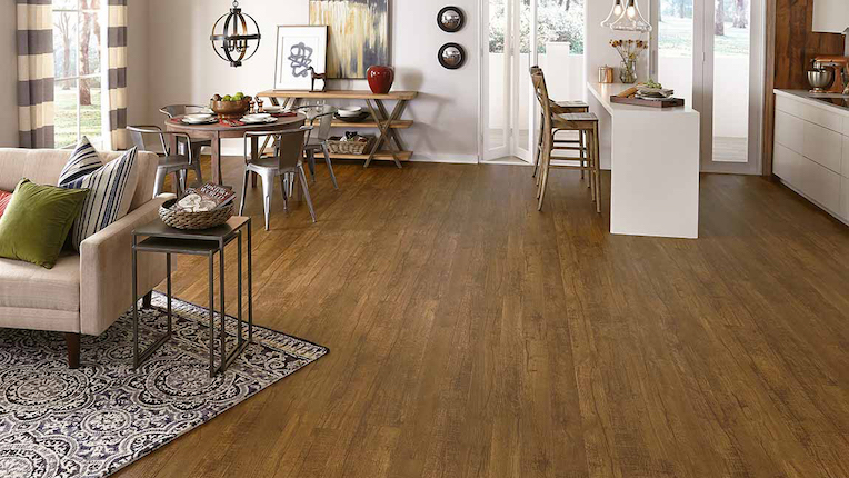 luxury vinyl plank flooring in a open kitchen and living room