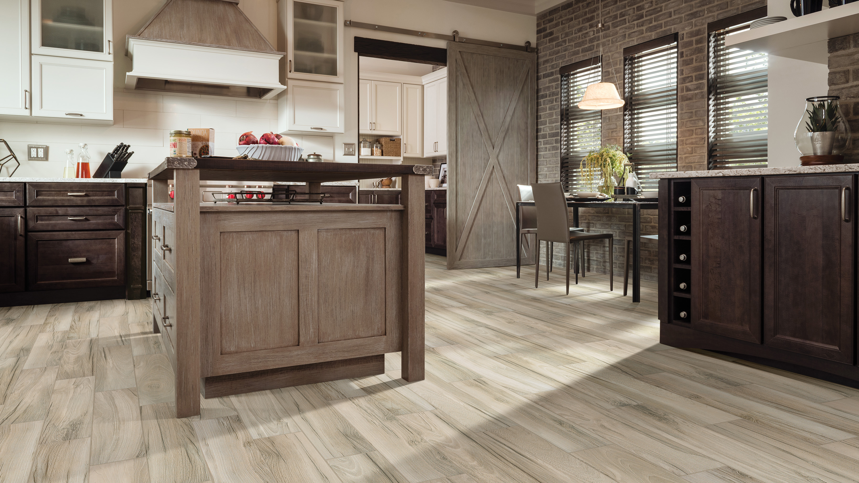 Wood-look tile flooring in a kitchen, installation services available.